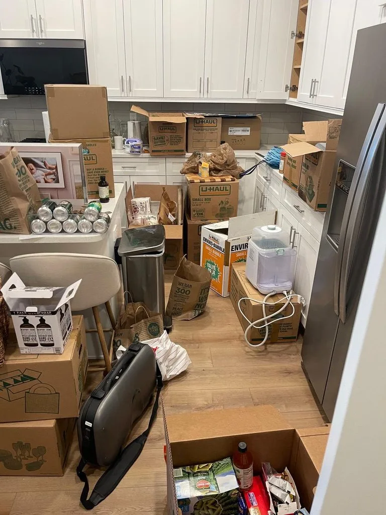 A kitchen packed into moving boxes
